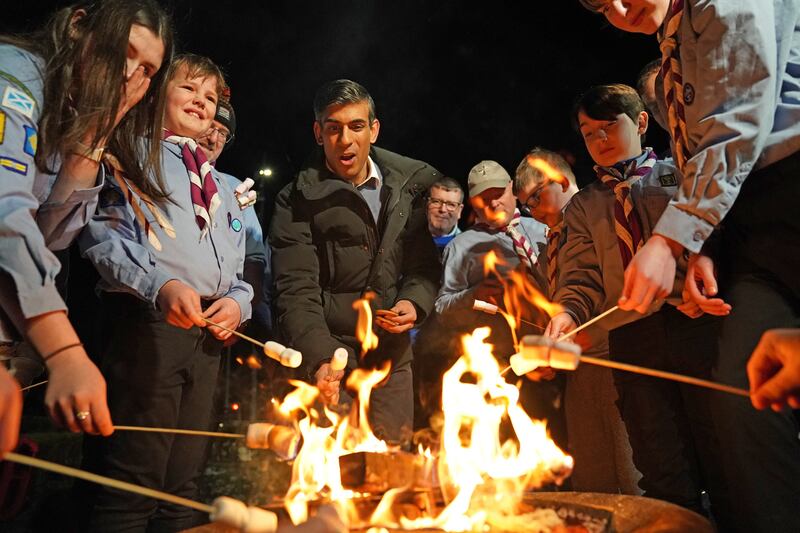 Toasting marshmallows on a visit to the Sea Scouts community group in Muirtown near Inverness. Getty Images