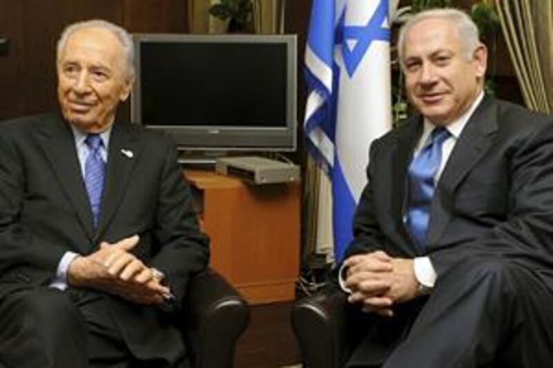 President Shimon Peres, left, meets Benjamin Netanyahu in Jerusalem ahead of asking the Likud party leader to form a government.