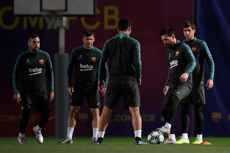 Jordi Alba, Carles Perez, Lionel Messi and Sergi Roberto attend a training session. AFP