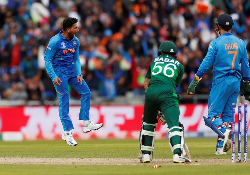 Cricket - ICC Cricket World Cup - India v Pakistan - Emirates Old Trafford, Manchester, Britain - June 16, 2019   India's Kuldeep Yadav celebrates the wicket of Pakistan's Babar Azam    Action Images via Reuters/Lee Smith