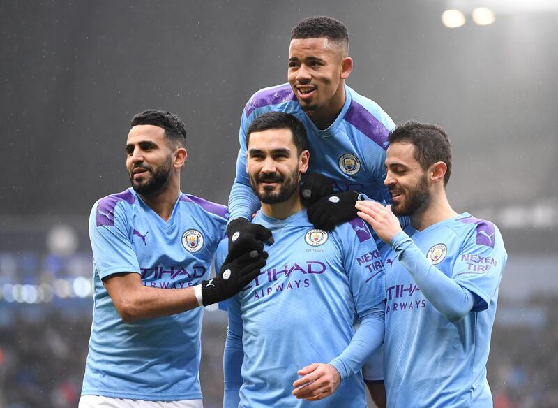 MANCHESTER, ENGLAND - JANUARY 26: Ilkay Gundogan of Manchester City celebrates after scoring his team's first goal with Gabriel Jesus, Riyad Mahrez and Bernardo Silva  during the FA Cup Fourth Round match between Manchester City and Fulham at Etihad Stadium on January 26, 2020 in Manchester, England. (Photo by Laurence Griffiths/Getty Images)
