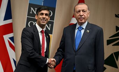 UK Prime Minister Rishi Sunak, left, shakes hands with Turkey's President Recep Tayyip Erdogan during the Nato summit in Vilnius, Lithuania, in July. PA