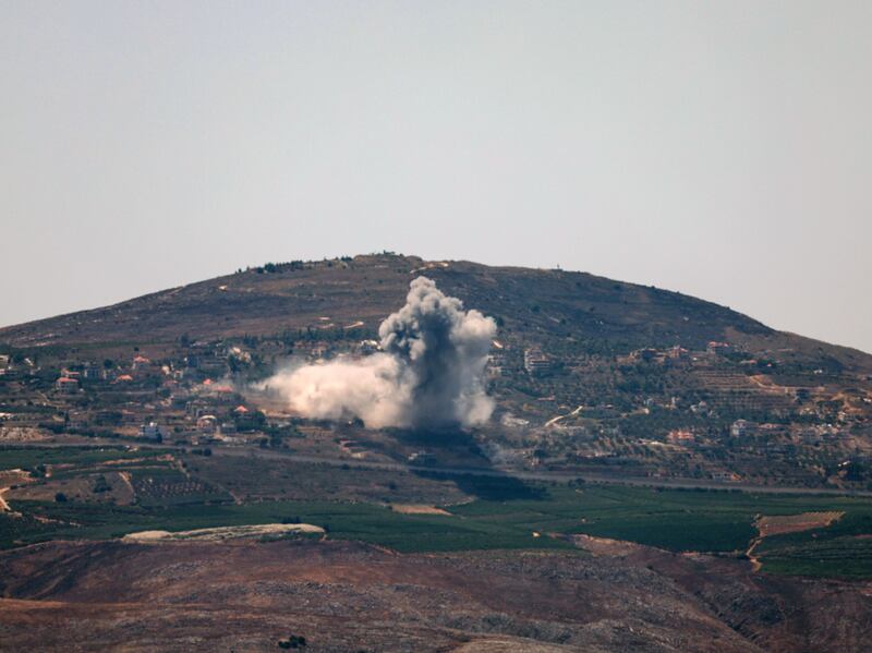 Smoke rises as a result of an Israeli air strike in the southern Lebanese town of Odaisseh. EPA