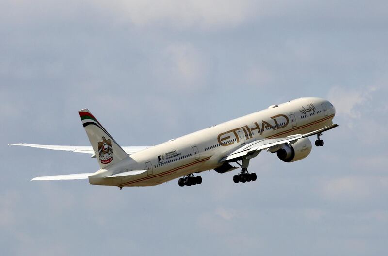 FILE PHOTO: An Etihad Airways Boeing 777-3FX aircraft takes off at the Charles de Gaulle airport in Roissy, France, August 9, 2016. REUTERS/Jacky Naegelen/File Photo