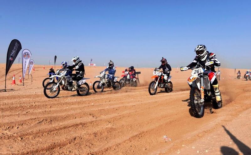 Bikes tear through the sand during the UAE Desert Championship. Courtesy UAE Desert Championship