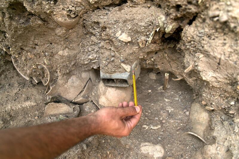 FUJAIRAH, UNITED ARAB EMIRATES - MARCH 01, 2018.

The first uncovered part of the site contains bones, pottery and vessels made of stone.

The ancient burial site has been uncovered in Dibba Al Fujairah and is being excavated by a team of German archeologists and a team from Fujairah Tourism and Antiquities Authority.

(Photo: Reem Mohammed/ The National)

Reporter: John Dennehy
Section: NA