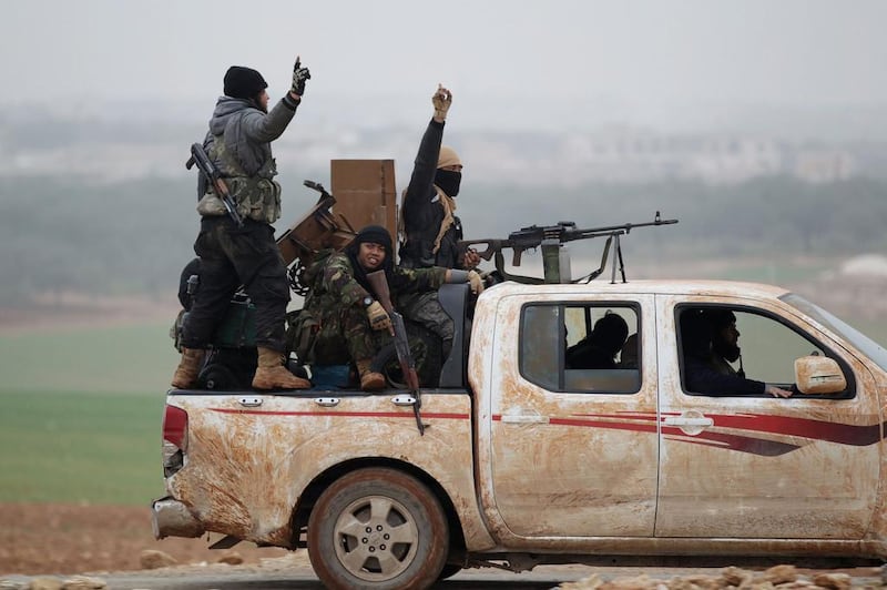Fighters from Jabhat Al Nusra, now known as Hayat Tahrir Al Sham, in 2014. Khalil Ashawi / Reuters