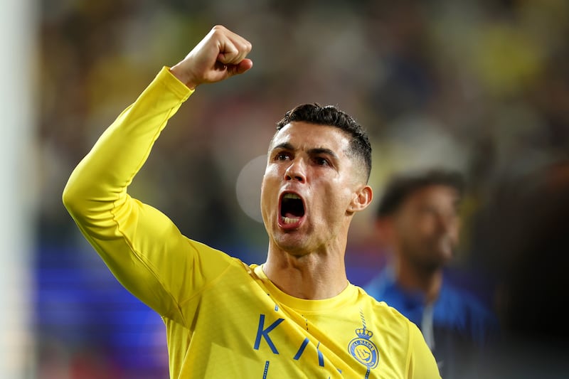 RIYADH, SAUDI ARABIA - FEBRUARY 21: Cristiano Ronaldo of Al Nassr celebrates after the team's victory in the second leg of the AFC Champions Leauge Round of 16 match between Al Nassr and Al Fayha at Al Awwal Park on February 21, 2024 in Riyadh, Saudi Arabia. (Photo by Yasser Bakhsh / Getty Images)