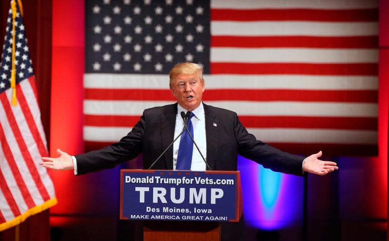 FILE - In this Jan. 28, 2016 file photo, Donald Trump speaks behind a DonaldTrumpforVets.com sign at a fundraising event in Des Moines, Iowa, at Drake University during Trump's campaign for president. New York Attorney General Barbara Underwood filed a lawsuit Wednesday June 13, 2018, accusing Trump of illegally using his charitable foundation to pay legal settlements related to his golf clubs and to bolster his presidential campaign. The complaint said the Iowa event, held in lieu of Trump participating in a televised debate the same day, which billed itself as allowing donors to make charitable contributions to veteransâ€™ organizations was, in reality, a Trump campaign event in which the Trump Foundation shouldnâ€™t have participated. (AP Photo/Andrew Harnik, File)