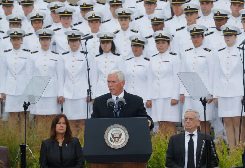 Vice President Mike Pence speaks during the September 11th Pentagon Memorial Observance at the Pentagon. Also on stage are Mattis and Pence's wife, Karen. AP Photo