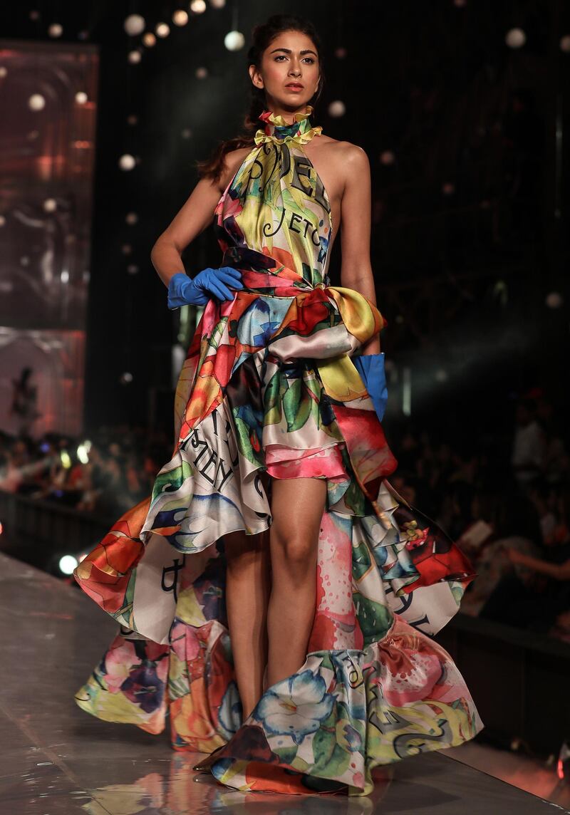 epa07793603 A model presents a creation by Indian designers Gauri and Nainika during the grand finale of Lakme Fashion Week (LFW) Winter/Festive 2019 in Mumbai, India, 25 August 2019. More than 75 designers were showcasing their collections at the event.  EPA/DIVYAKANT SOLANKI