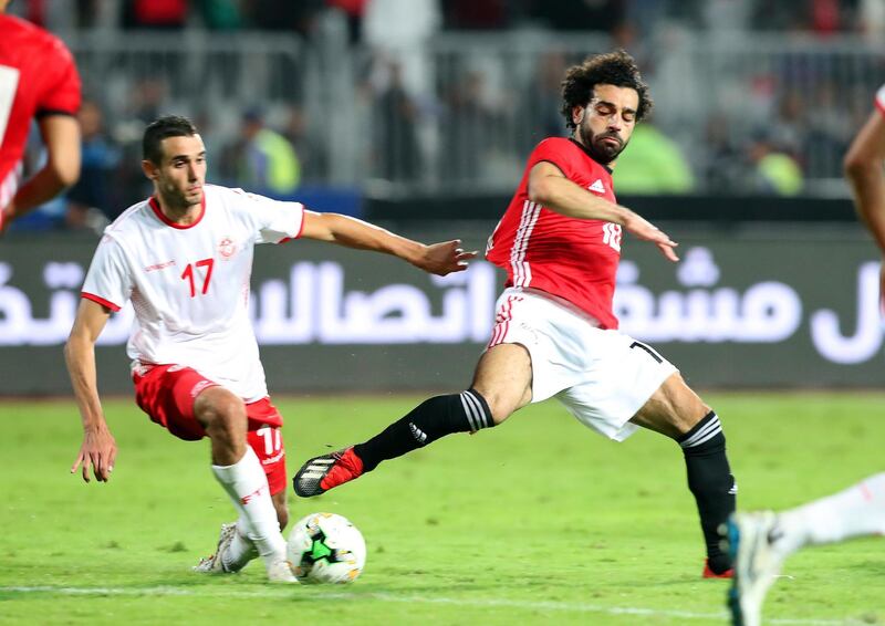epa07171113 Egypt's Mohamed Salah (R) in action against Tunisia's Ellyes Skhiri (L) during the Africa Cup of Nations (AFCON) 2019 qualifying soccer match between Egypt and Tunisia in Alexandria, Egypt, 16 November 2018.  EPA/KHALED ELFIQI