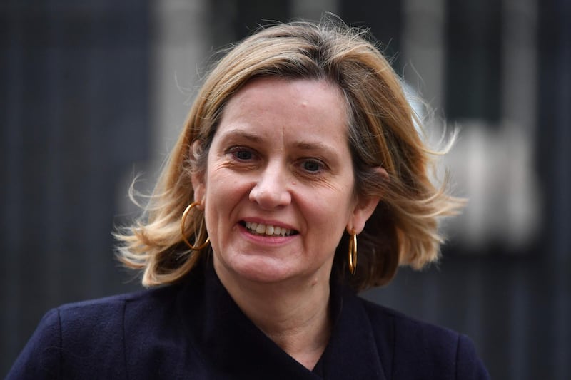 (FILES) In this file photo taken on November 26, 2018 Britain's Work and Pensions Secretary Amber Rudd leaves 10 Downing Street in London on November 26, 2018 after attending the weekly meeting of the cabinet.  senior government minister called on December 15, 2018 for British MPs from all parties to "forge a consensus" on Brexit to avoid a potentially damaging "no deal" withdrawal from the EU in March. / AFP / Ben STANSALL

