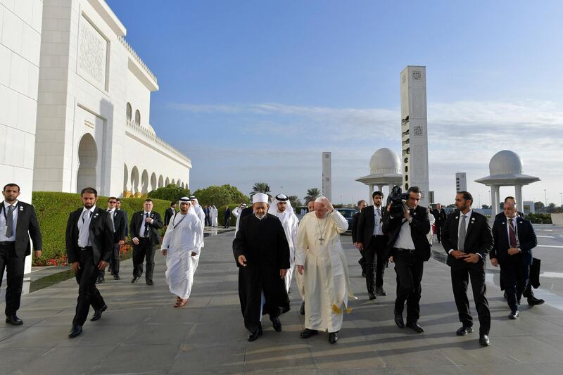 Pope Francis and Dr Ahmed Al Tayeb arrive for a meeting with the Muslim Council of Elders at the Sheikh Zayed Grand Mosque in Abu Dhabi. Reuters