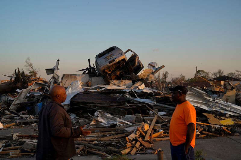 A vehicle sits on top of a pile of rubble Rolling Fork, Mississippi after thunderstorms spawning high straight-line winds and tornadoes ripped across the US state. Reuters