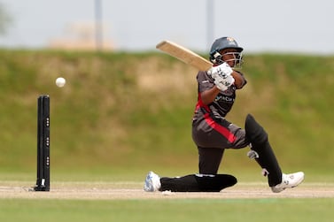UAE's Theertha Satish hits out during her innings of 12 not out against Hong Kong in the 4th T20 international at the Malek Cricket Ground, Ajman. Chris Whiteoak / The National