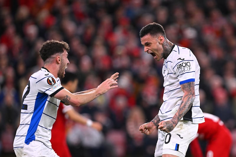 Atalanta striker Gianluca Scamacca, right, scored twice as the Italian side claimed a 3-0 win over Liverpool in their Europa League quarter-final first leg at Anfield. Getty