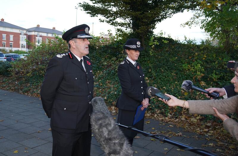 Chief officer of Merseyside Fire and Rescue Service Phil Garrigan with Merseyside Chief Constable Serena Kennedy outside the hospital.