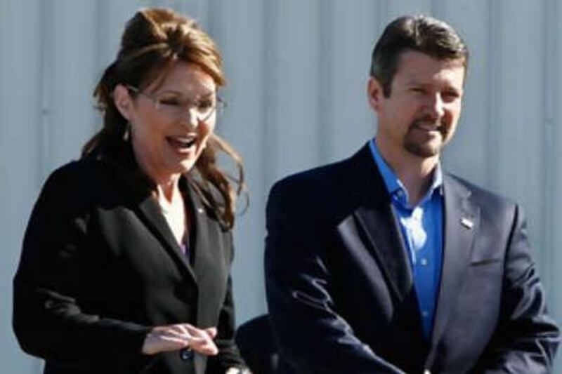 An earlier investigation found that Sarah Palin had abused her power by pressuring subordinates to get the former public safety commissioner fired, and allowing her husband, Todd Palin, right, to do the same.