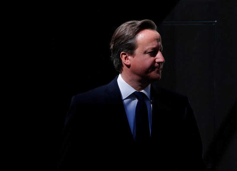 Britain's Prime Minister David Cameron waits to greet the President of the United Arab Emirates Sheikh Khalifa bin Zayed Al Nahayan outside 10 Downing Street in central London, May 1, 2013. Sheikh Al Nahayan is on a two day state visit to England.  REUTERS/Andrew Winning (BRITAIN - Tags: POLITICS) *** Local Caption ***  AWI07_BRITAIN-_0501_11.JPG