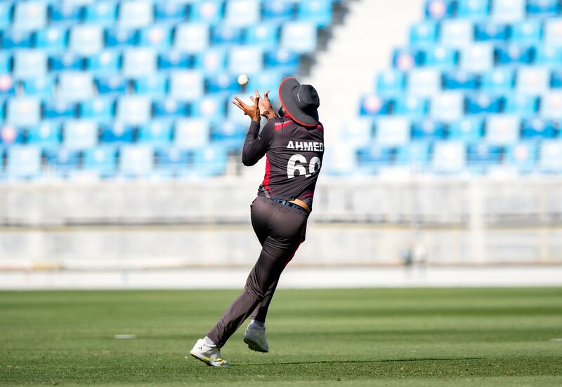 UAE's Ahmed Raza takes a catch off the bowling of Basil Hameed to dismiss Nepal's Kamal Airee.