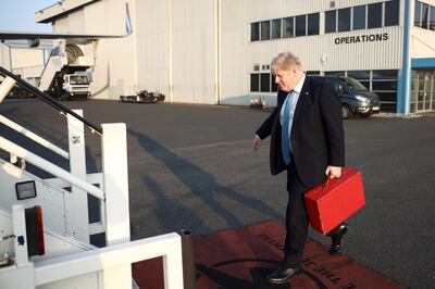 UK Prime Minister Boris Johnson boarding an aircraft at Stansted Airport to travel to Brussels on Thursday. AFP 
