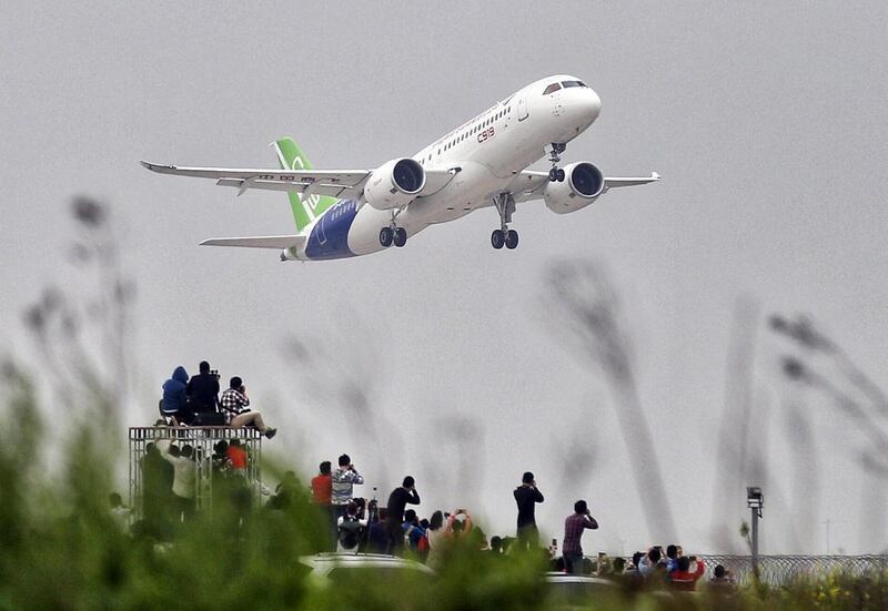 The first flight of the Comac C919 from Pudong International Airport in Shanghai, China. Ning De /  EPA