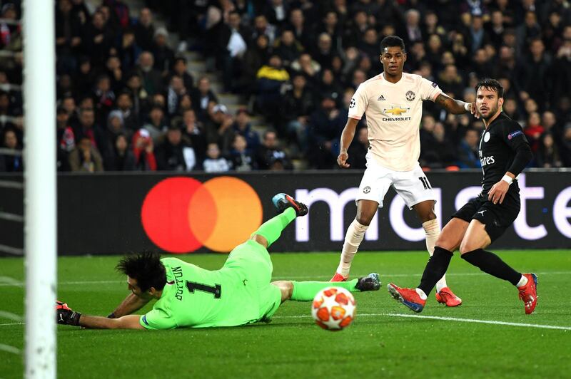 PARIS, FRANCE - MARCH 06:  Marcus Rashford of Manchester United shoots past Gianluigi Buffon of PSG during the UEFA Champions League Round of 16 Second Leg match between Paris Saint-Germain and Manchester United at Parc des Princes on March 06, 2019 in Paris, . (Photo by Shaun Botterill/Getty Images)