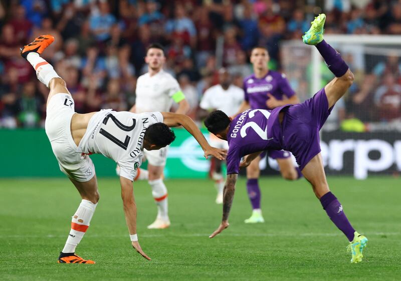 West Ham's Nayef Aguerd, left, and Fiorentina's Nicolas Gonzalez battle. Reuters