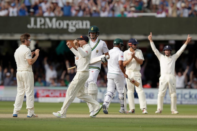 England captain Joe Root, second left, celebrates the final wicket to win the first Test with England's Liam Dawson, left, who took the wicket of South Africa's Morne Morkel, third left,at Lord's cricket ground in London, Sunday, July 9, 2017.