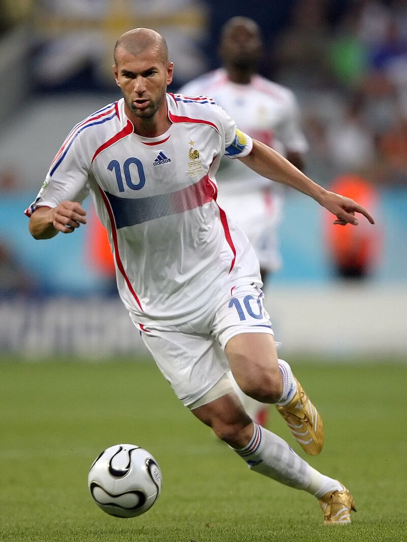 French midfielder Zinedine Zidane drives the ball during the World Cup 2006 semi final football game Portugal vs. France, 05 July 2006 at Munich stadium. AFP PHOTO / VALERY HACHE / AFP PHOTO / VALERY HACHE