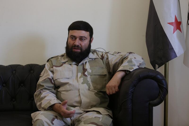 Jaish al-Islam commander, Issam al-Buwaydani talks to Reuters in the town of Soussian in Aleppo countryside, Syria September 23, 2018. Picture taken September 23, 2018. REUTERS/Khalil Ashawi
