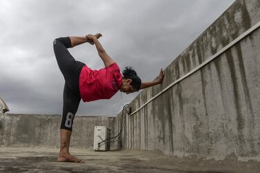 Yoga instructor Pratibha Agarwal performs postures in Hyderabad, India, before International Yoga Day on June 21. AFP 