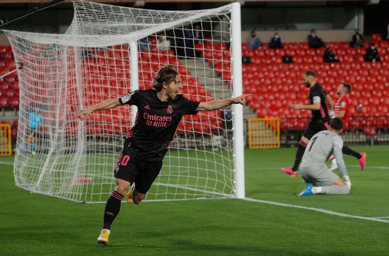 Real Madrid's Luka Modric celebrates scoring their first goal against Granada on Thursday. Reuters