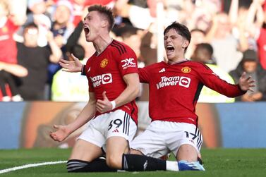 Manchester United's Scottish midfielder #39 Scott McTominay (L) celebrates with Manchester United's Argentinian midfielder #17 Alejandro Garnacho (R) after scoring their second goal during the English Premier League football match between Manchester United and Brentford at Old Trafford in Manchester, north west England, on October 7, 2023.  (Photo by Darren Staples / AFP) / RESTRICTED TO EDITORIAL USE.  No use with unauthorized audio, video, data, fixture lists, club/league logos or 'live' services.  Online in-match use limited to 120 images.  An additional 40 images may be used in extra time.  No video emulation.  Social media in-match use limited to 120 images.  An additional 40 images may be used in extra time.  No use in betting publications, games or single club/league/player publications.   /  