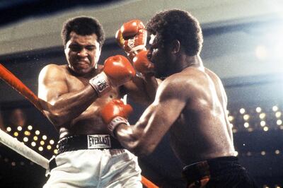 (FILES) In this file photo taken on February 15, 1978 World heavyweight champion Muhammad Ali (L) and US Leon Spinks (R) fight in Las Vegas during their world heavyweight championship match. Former world heavyweight boxing champion Leon Spinks, who took the crown from Muhammad Ali in 1978 before losing a rematch, died on February 5, 2021, according to his publicists. He was 67. / AFP / CONSOLIDATED NEWS PICTURES / -
