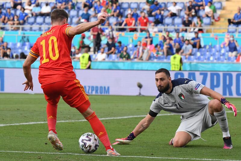 Wales' Aaron Ramsey tries to find a way past Italy goalkeeper Gianluigi Donnarumma. AP