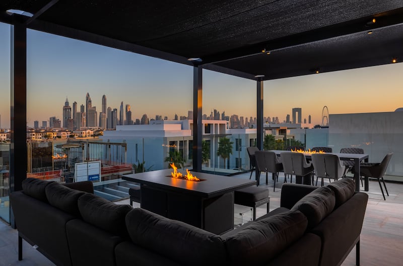 Dubai Marina skyline can be seen from the rooftop terrace.