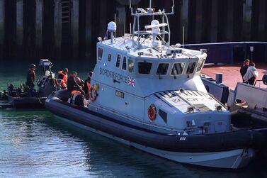 A Border Force boat returns to Dover, Kent, England carrying people thought to be migrants after they were picked-up crossing the English Channel on Friday, Febuary 7, 2020. PA via AP