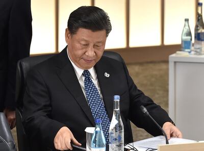 Chinese President Xi Jinping attends the session 3 on women's workforce participation, future of work, and ageing societies at the G20 Summit in Osaka on June 29, 2019. Kazuhiro Nogi/Pool via REUTERS