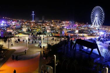 People spend the evening at the Diriyah Oasis amusement park on the outskirts of Riyadh. Saudi Arabia is pushing to diversify its economy away from oil. AP