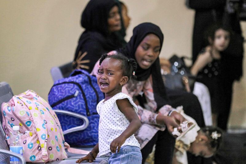 Evacuees from Sudan arrive at Baghdad International Airport on June 18. AFP