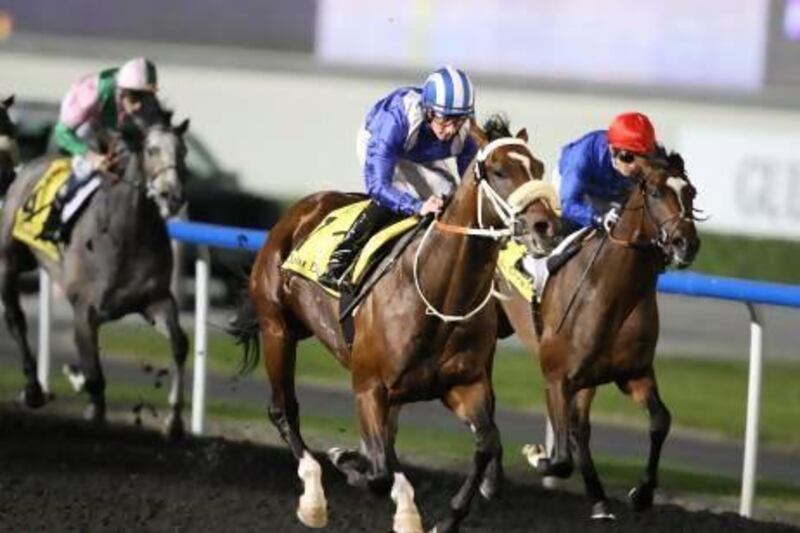 Soft Falling Rain, centre, was guided to a win by Paul Hanagan in Dubai. Mike Young / The National