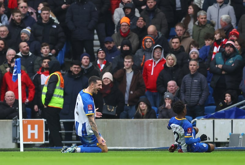 Lewis Dunk celebrates scoring for Brighton. Reuters