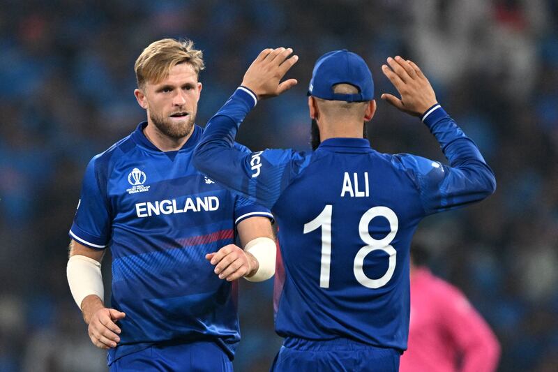 England's David Willey after taking the wicket of Suryakumar Yadav. AFP