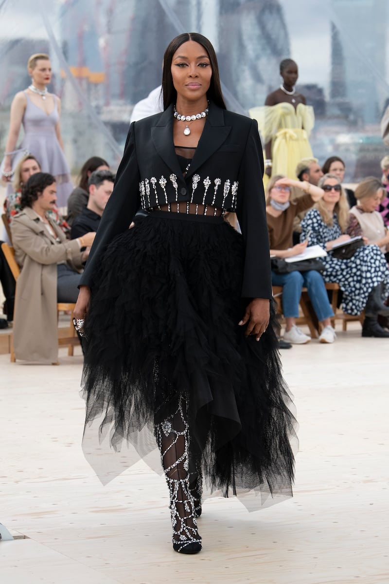 Supermodel Naomi Campbell closed the Alexander McQueen spring/summer 2022 show in a skeletal corset dress and single-breasted jacket with crystal embroidery. All Photos: Alexander McQueen