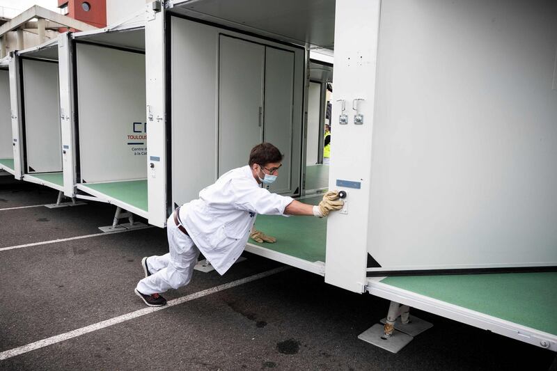 A health worker installs a new mobile field hospital in Toulouse, southern France. AFP