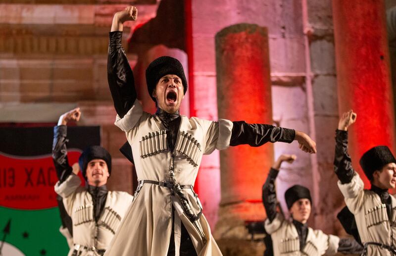 Circassian dancers from Al-Jeel Al-Jadeed Club (the New Generation Club) perform during the 2019 Jerash Festival of Culture and Arts at the Jerash archeological site, Jerash, some 46 km North of Amman, Jordan.  EPA