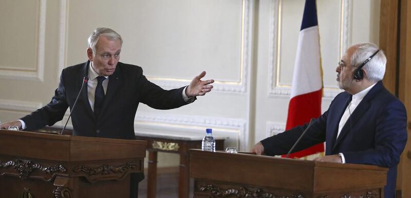 French foreign minister Jean-Marc Ayrault, left, speaks during a joint press conference with his Iranian counterpart, Mohammad Javad Zarif, in Tehran on January 31, 2017. Vahid Salemi / AP Photo