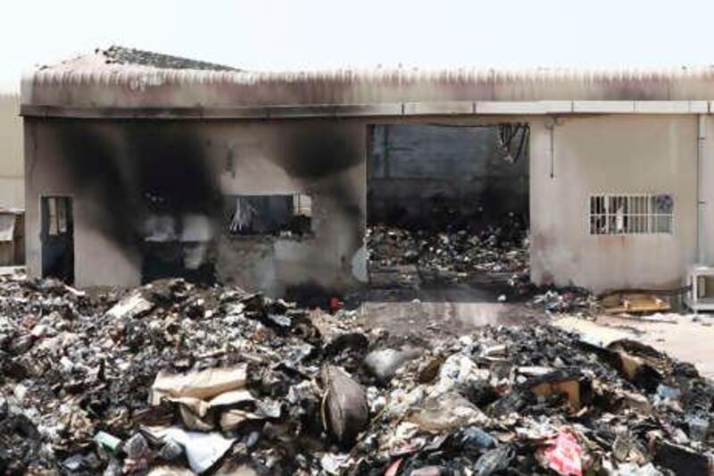 Dubai, 11th August 2010.  The aftermath of yesterday's fire at Afnan Perfumes Factory LLC, in Al Qouz Industrial Area 4.  (Jeffrey E Biteng / The National)